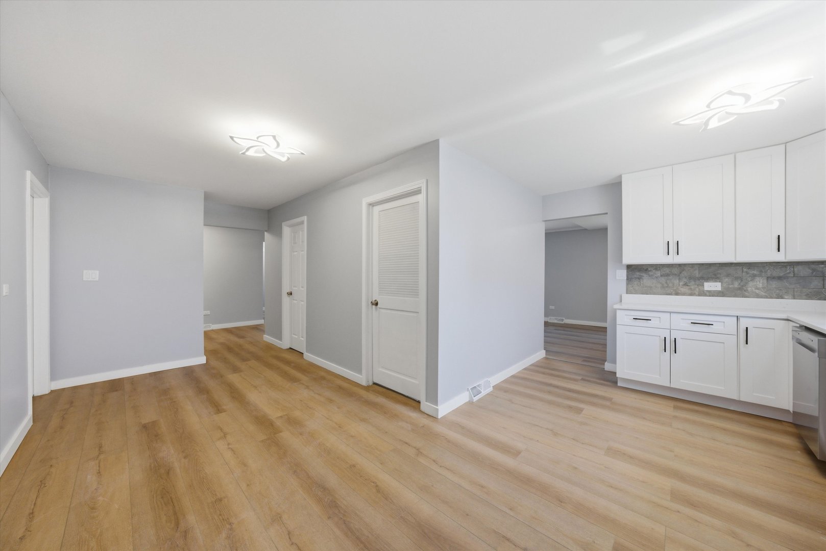 518 Apollo Drive Joliet, IL 60435 - Photo 6 of 25 a view of a kitchen with wooden floor