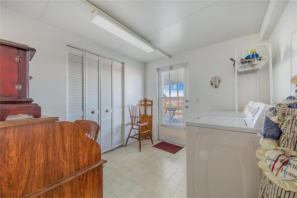 251 Patterson Road, Unit F22 Haines City, FL 33844 - Photo 19 of 50 a bed room with a bed and a couch