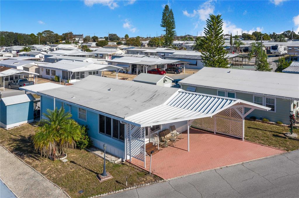 251 Patterson Road, Unit F22 Haines City, FL 33844 - Photo 2 of 50 a view of a terrace with sitting area