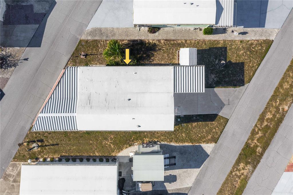 251 Patterson Road, Unit F22 Haines City, FL 33844 - Photo 23 of 50 an aerial view of residential houses with outdoor space