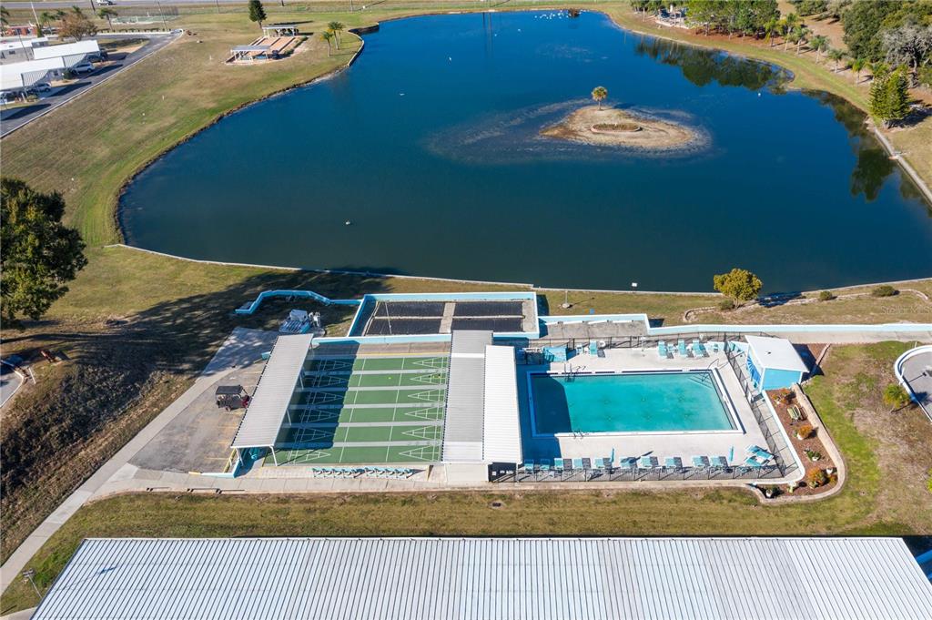 251 Patterson Road, Unit F22 Haines City, FL 33844 - Photo 27 of 50 a view of a swimming pool with an outdoor space