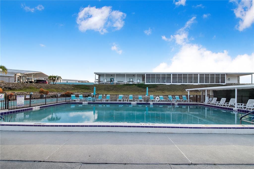 251 Patterson Road, Unit F22 Haines City, FL 33844 - Photo 33 of 50 a view of a lake with a city view