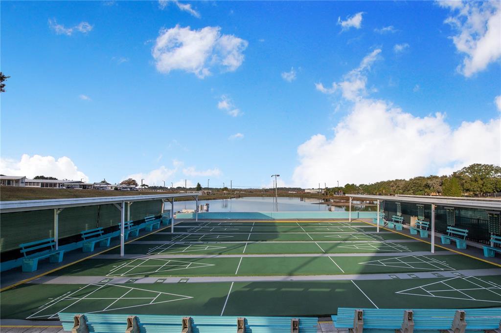 251 Patterson Road, Unit F22 Haines City, FL 33844 - Photo 36 of 50 a view of a big room with a big yard