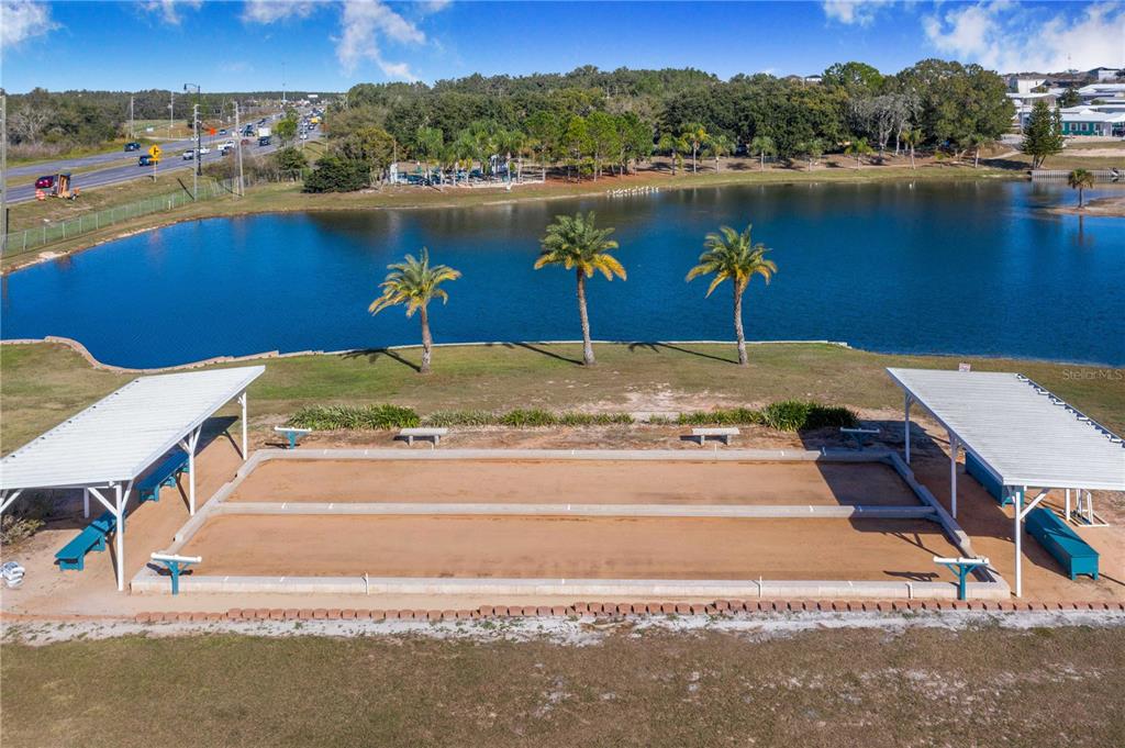 251 Patterson Road, Unit F22 Haines City, FL 33844 - Photo 41 of 50 an aerial view of a house with a lake view