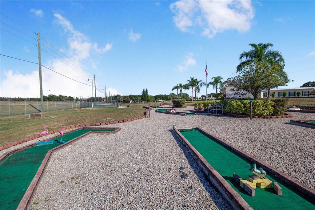 251 Patterson Road, Unit F22 Haines City, FL 33844 - Photo 45 of 50 a view of a lake with a beach