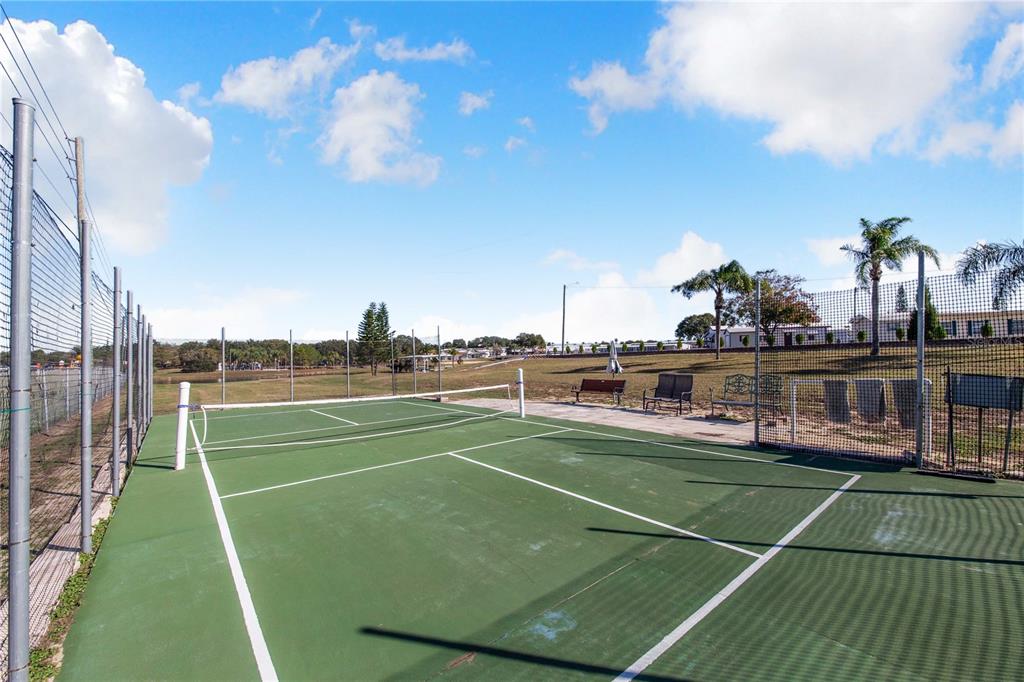 251 Patterson Road, Unit F22 Haines City, FL 33844 - Photo 48 of 50 a view of a tennis court