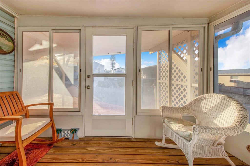 251 Patterson Road, Unit F22 Haines City, FL 33844 - Photo 7 of 50 a living room with furniture and a large window