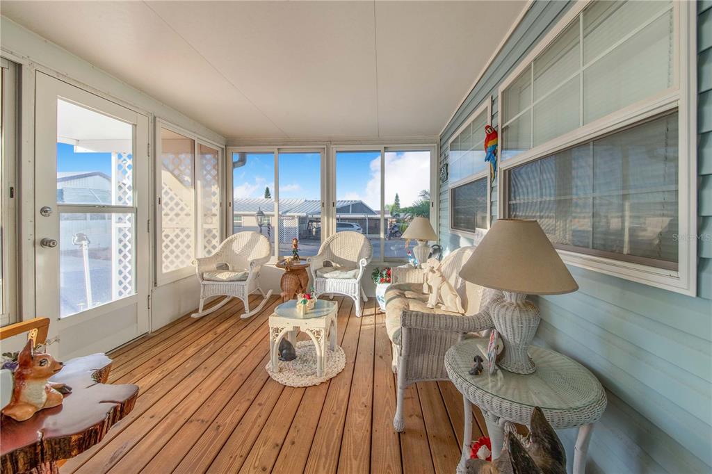 251 Patterson Road, Unit F22 Haines City, FL 33844 - Photo 8 of 50 a view of a dining room with furniture window and wooden floor