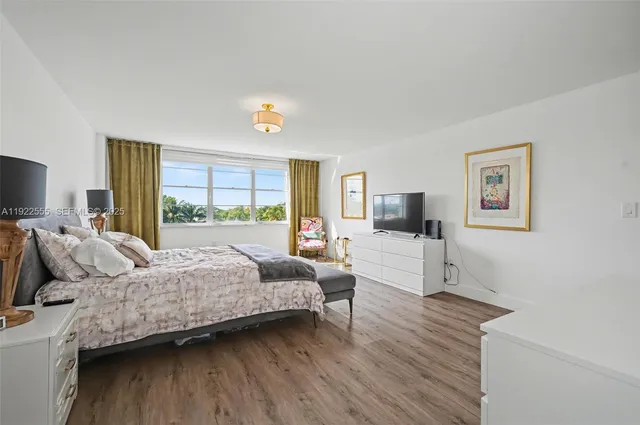 a view of a swimming pool with a terrace