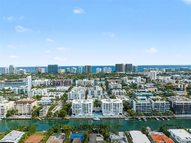 an aerial view of a city with lots of residential buildings