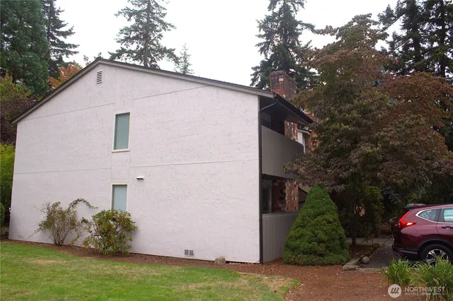 a backyard of a house with lots of green space