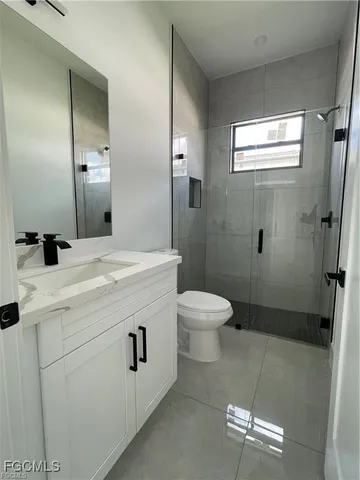 a view of a house with a big yard