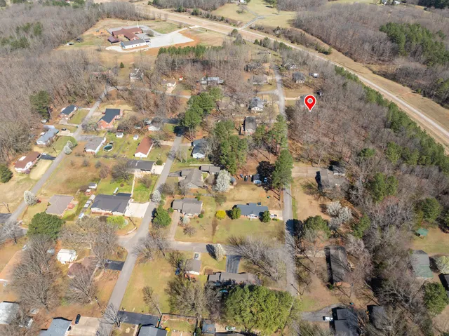 an aerial view of lake and residential houses