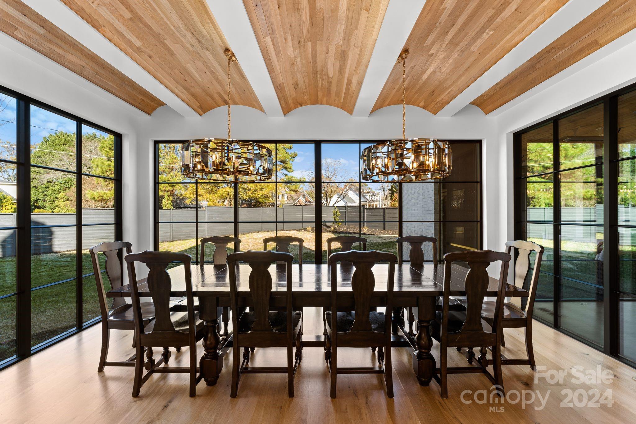 20218 Rainbow Circle Cornelius, NC 28031 - Photo 14 of 44 a view of a dining room with furniture window and outside view
