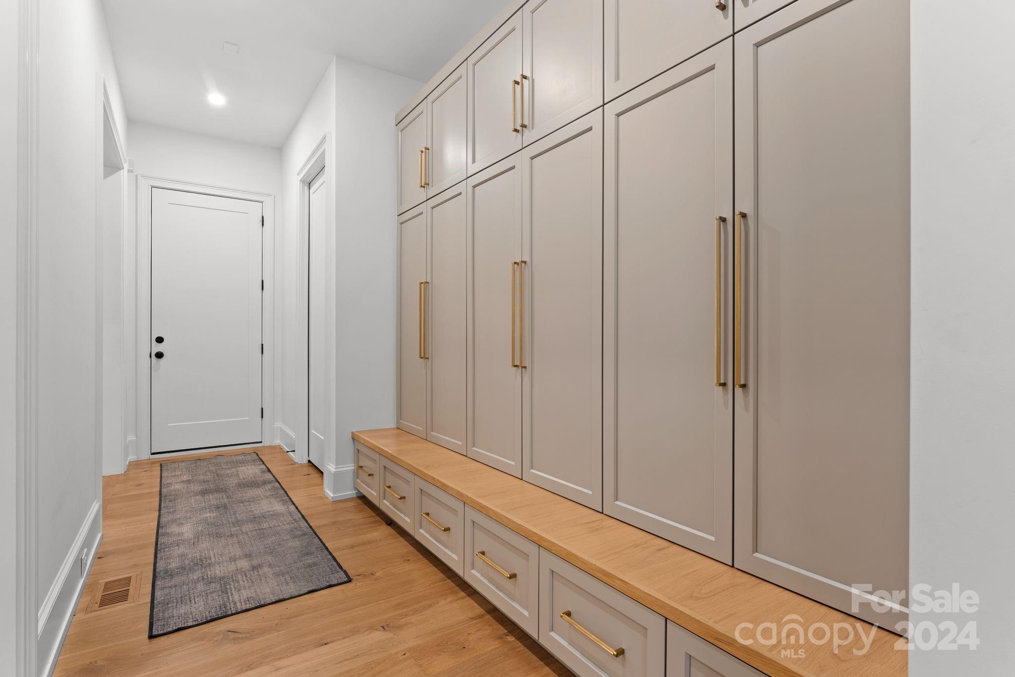 20218 Rainbow Circle Cornelius, NC 28031 - Photo 15 of 44 a view of room with window and hardwood
