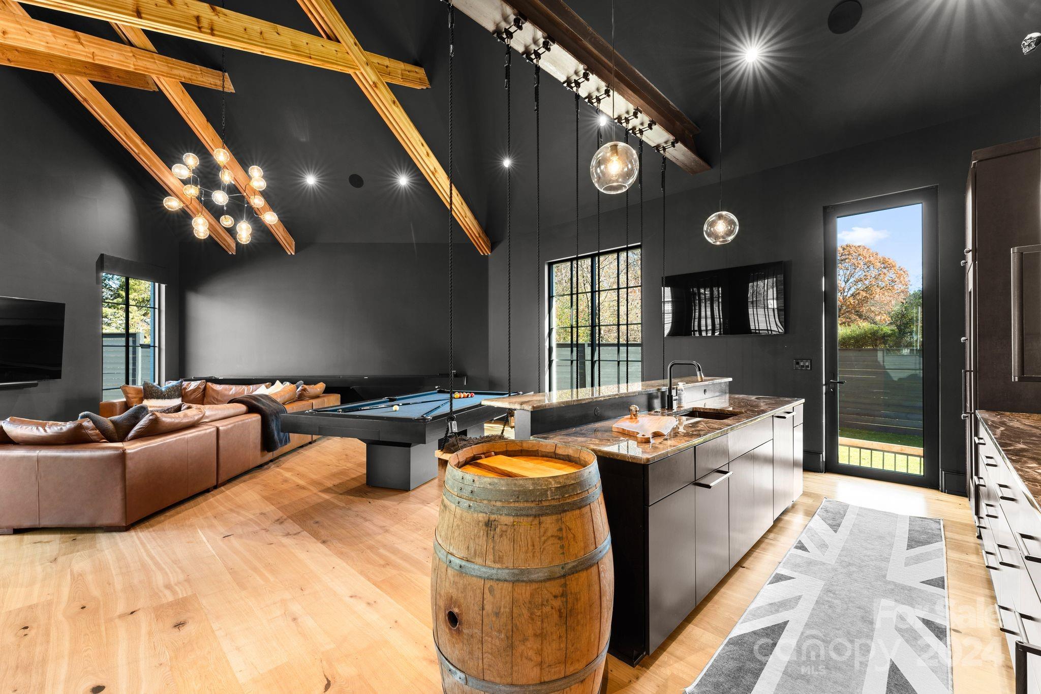 20218 Rainbow Circle Cornelius, NC 28031 - Photo 18 of 44 a kitchen with stainless steel appliances granite countertop a stove and cabinets