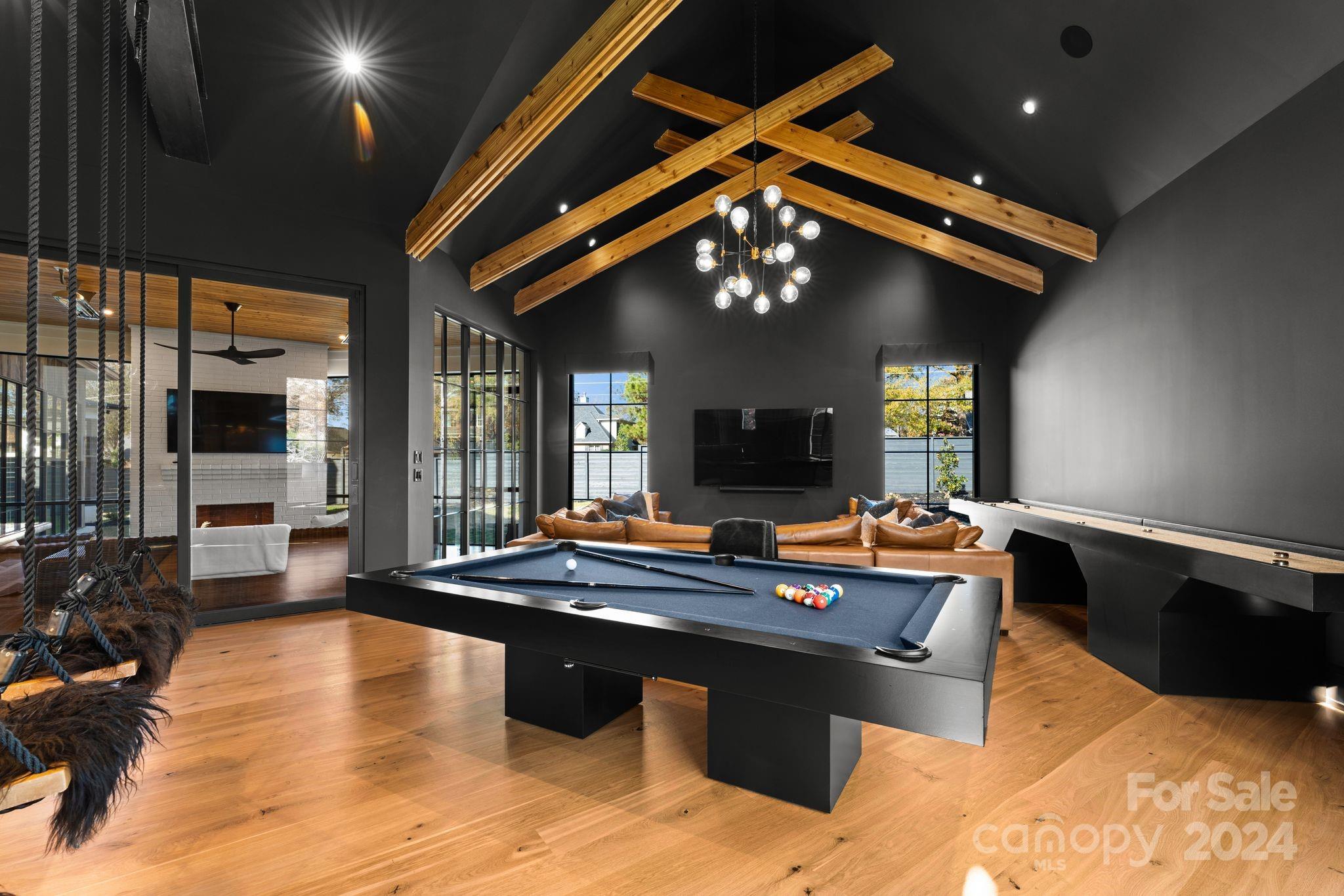 20218 Rainbow Circle Cornelius, NC 28031 - Photo 22 of 44 a view of a dining room with furniture window and wooden floor