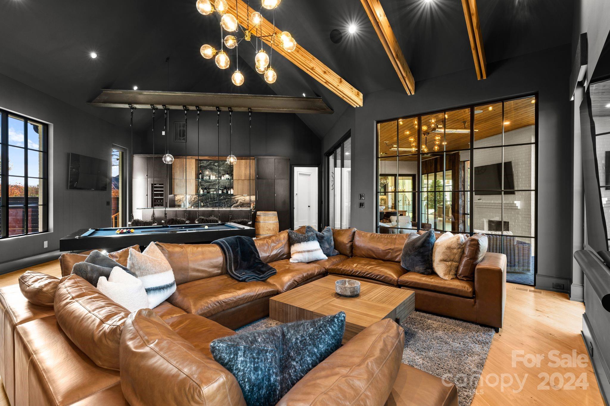 20218 Rainbow Circle Cornelius, NC 28031 - Photo 24 of 44 a living room with furniture and a large window
