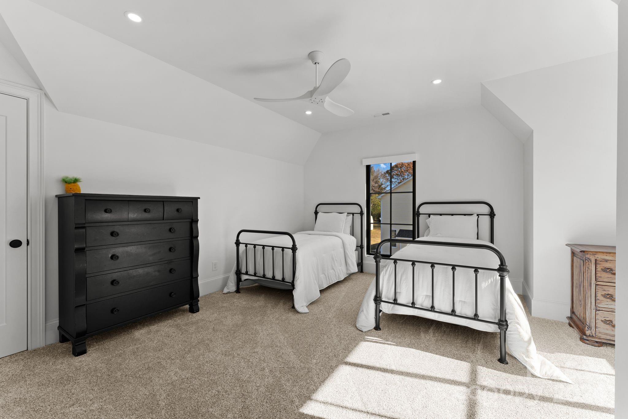 20218 Rainbow Circle Cornelius, NC 28031 - Photo 35 of 44 a view of a bedroom with furniture and windows