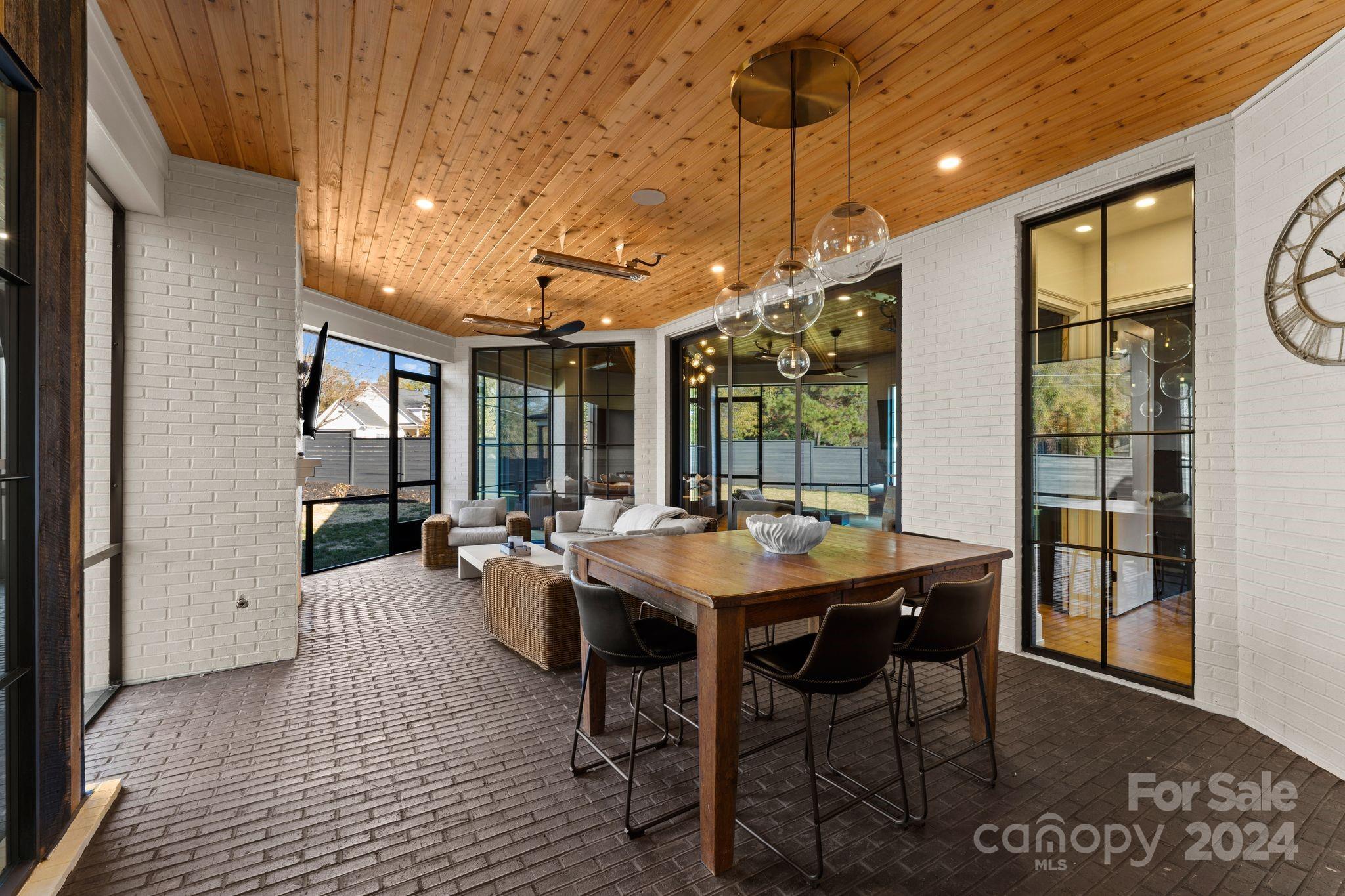 20218 Rainbow Circle Cornelius, NC 28031 - Photo 39 of 44 a view of a dining room with furniture window and outside view