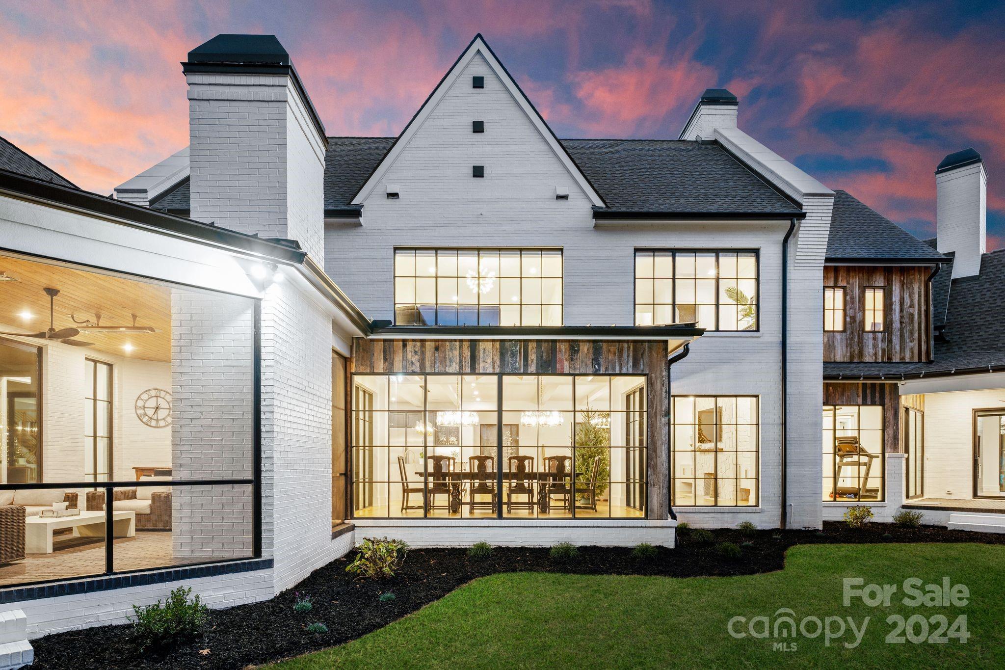20218 Rainbow Circle Cornelius, NC 28031 - Photo 42 of 44 a front view of a house with a yard