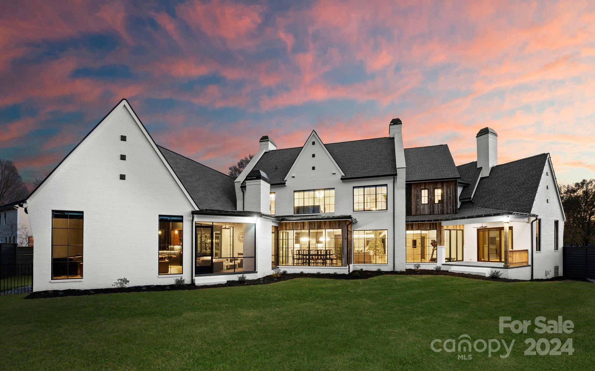 20218 Rainbow Circle Cornelius, NC 28031 - Photo 43 of 44 a front view of a house with a yard