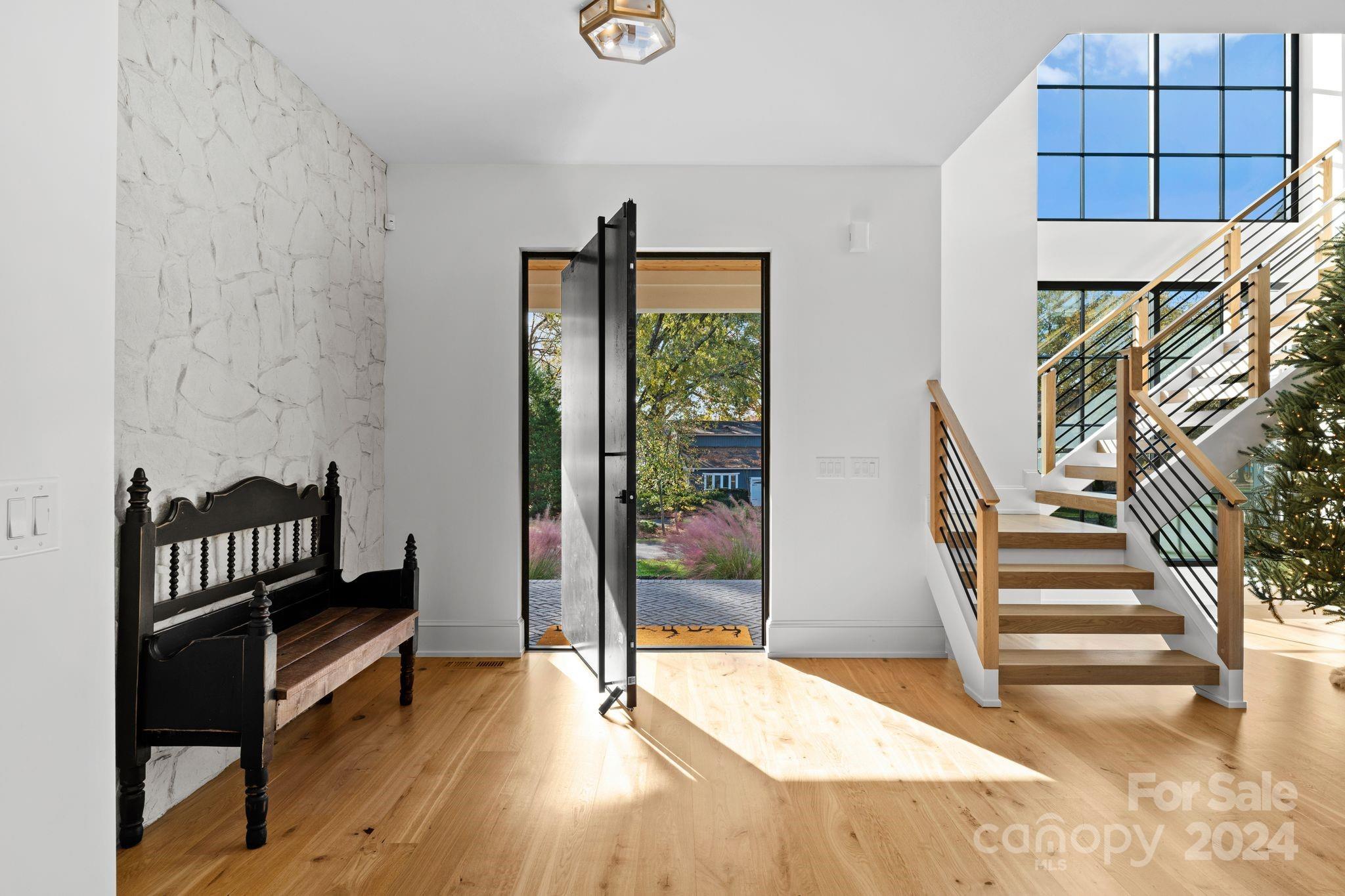 20218 Rainbow Circle Cornelius, NC 28031 - Photo 5 of 44 a view of entryway and hall with wooden floor