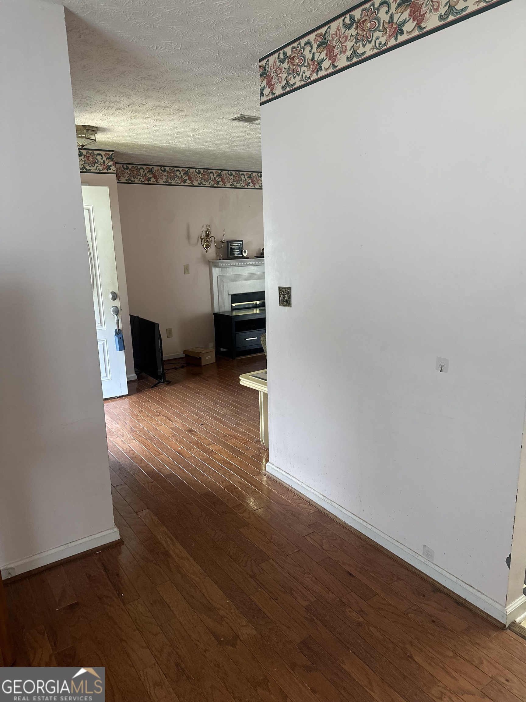 1616 Cobbs Creek Lane Decatur, GA 30032 - Photo 3 of 12 a view of a room with wooden floor