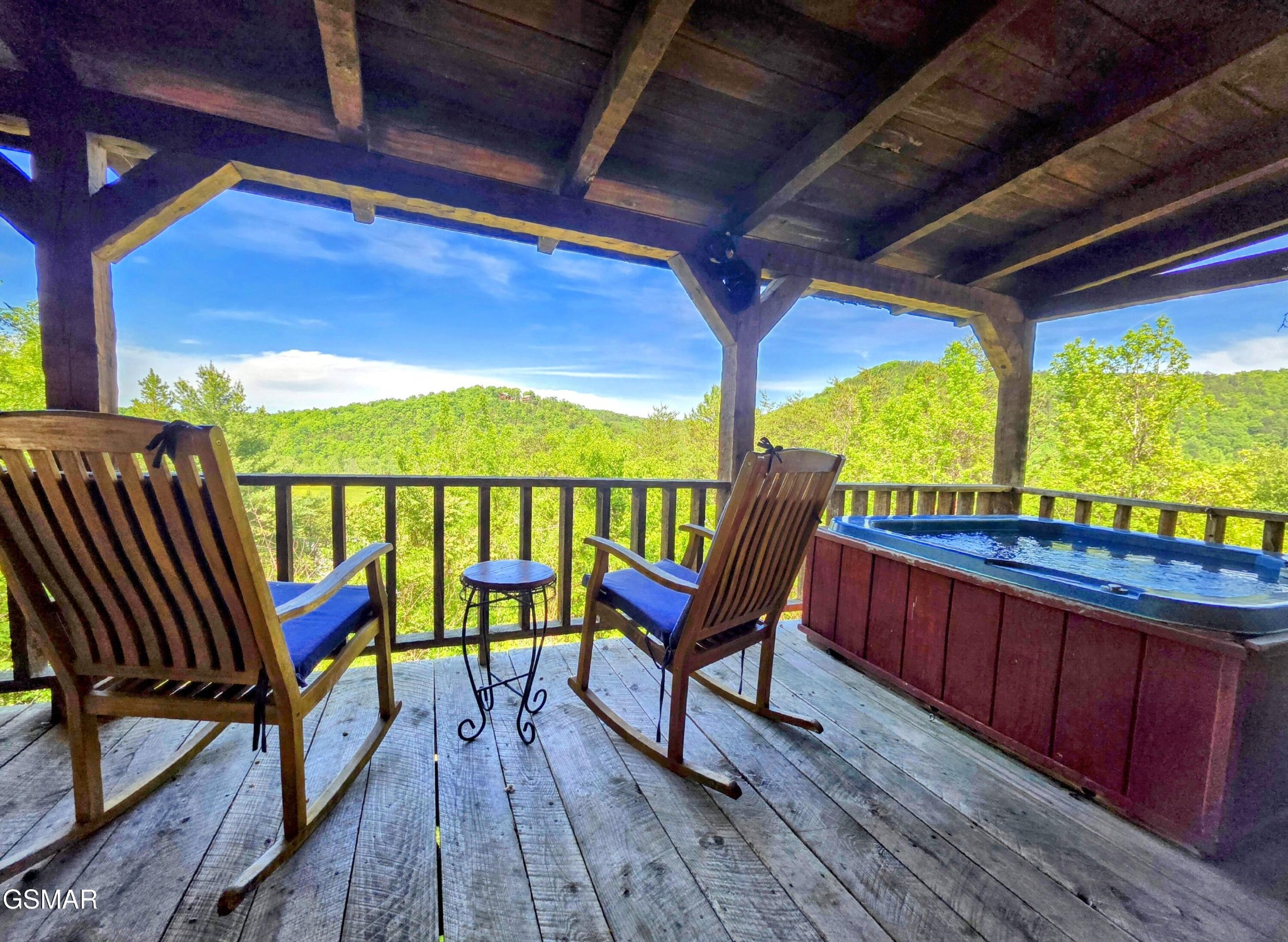 2570 Pittman Center Road Sevierville, TN 37876 - Photo 16 of 61 a view of a chairs on wooden deck