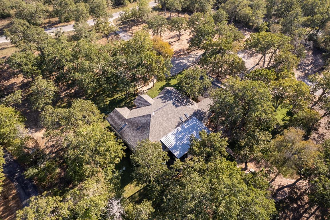 346 The Oaks Boulevard Elgin, TX 78621 - Photo 38 of 39 an aerial view of a house with a yard