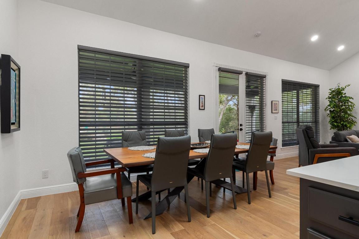 346 The Oaks Boulevard Elgin, TX 78621 - Photo 9 of 39 a dining room with furniture and wooden floor