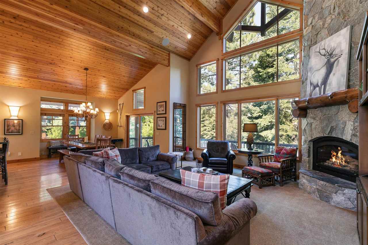 1755 Grouse Ridge Road Truckee, CA 96161 - Photo 16 of 20 a living room with furniture a fireplace and a large window