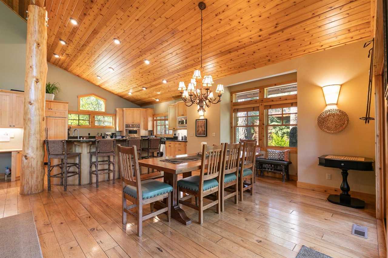 1755 Grouse Ridge Road Truckee, CA 96161 - Photo 3 of 20 a view of a dining room with furniture and wooden floor