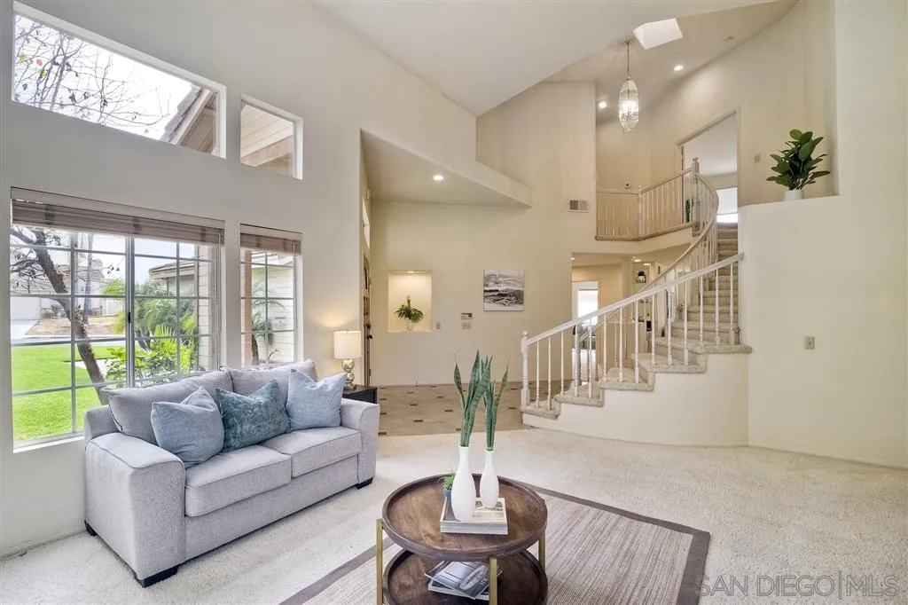 14228 Silver Ridge Road Poway, CA 92064 - Photo 3 of 25 a living room with furniture and a large window