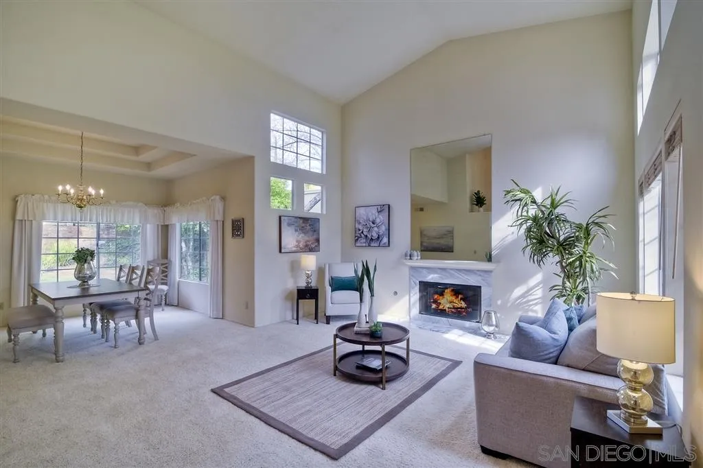 14228 Silver Ridge Road Poway, CA 92064 - Photo 4 of 25 a living room with furniture and a fireplace