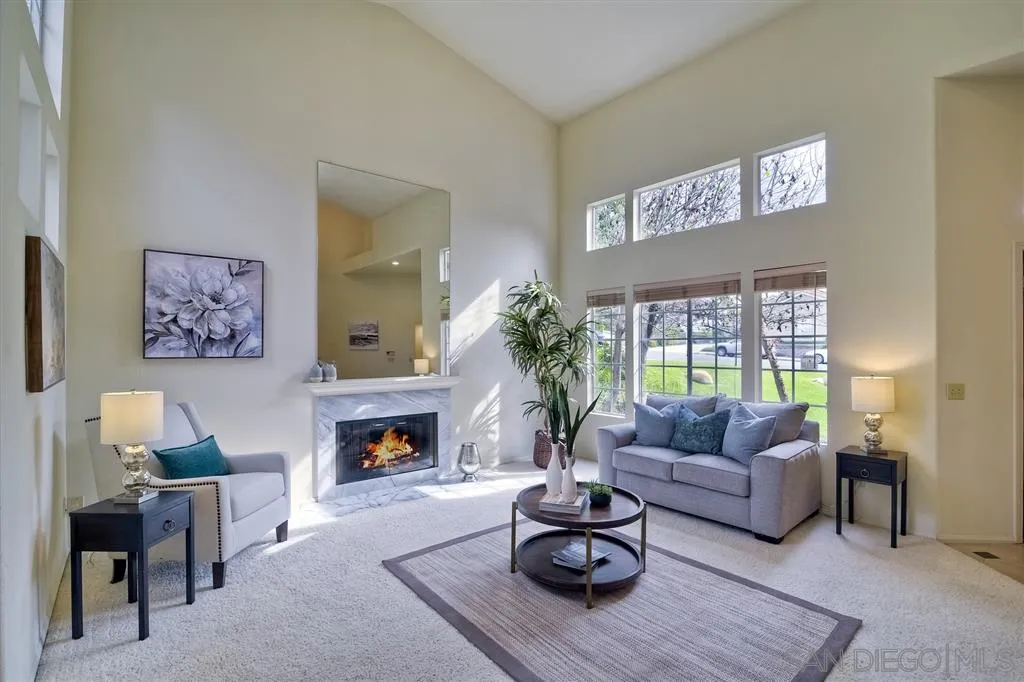 14228 Silver Ridge Road Poway, CA 92064 - Photo 5 of 25 a living room with furniture fireplace and window