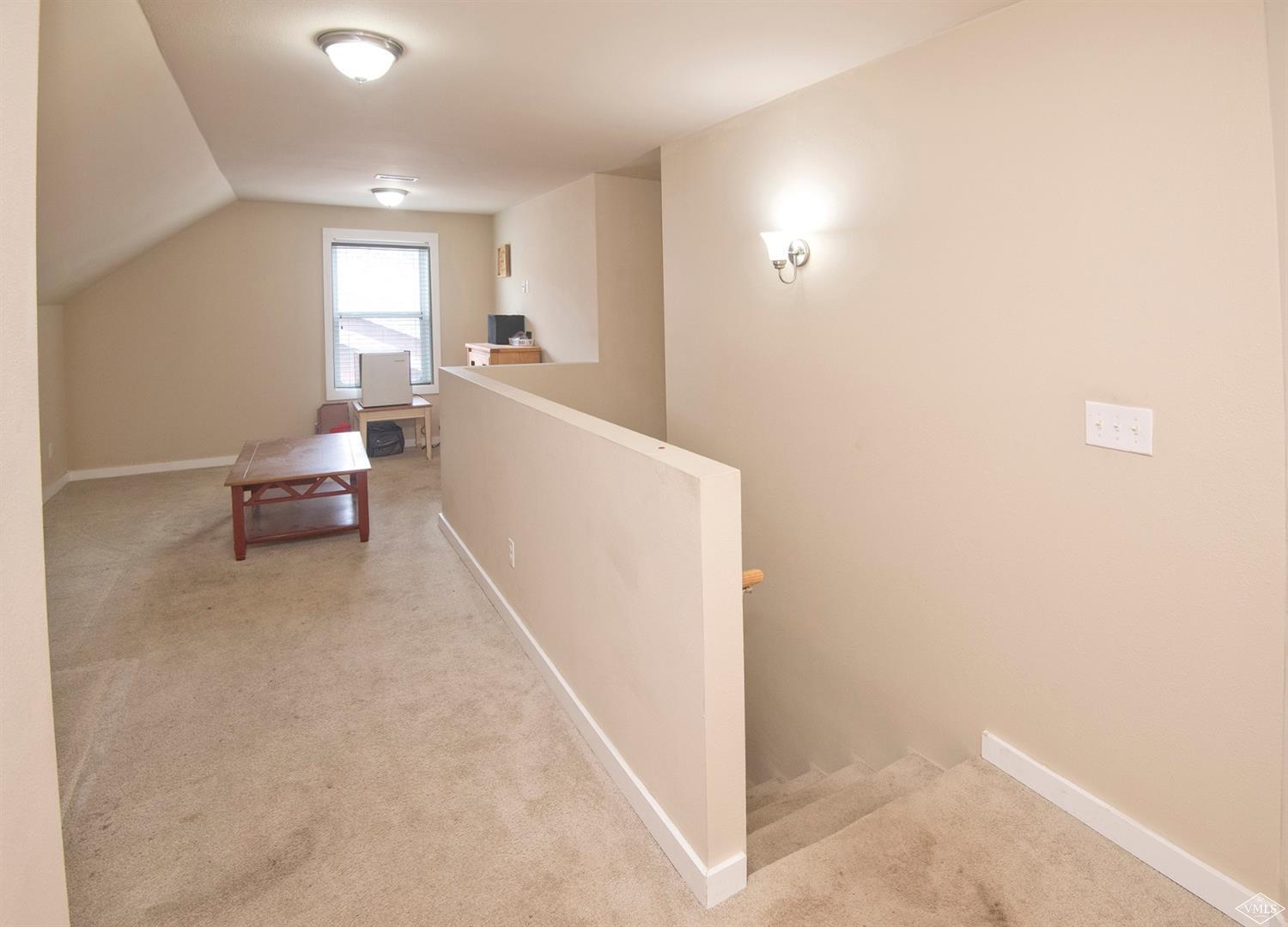 10 Salmon Loop Gypsum, CO 81637 - Photo 17 of 25 a living room with furniture and a window