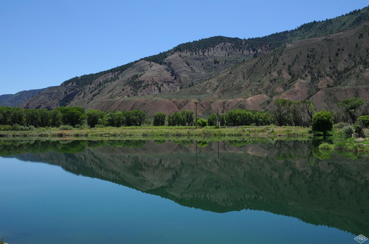 10 Salmon Loop Gypsum, CO 81637 - Photo 25 of 25 a view of a lush green hillside next to a mountain
