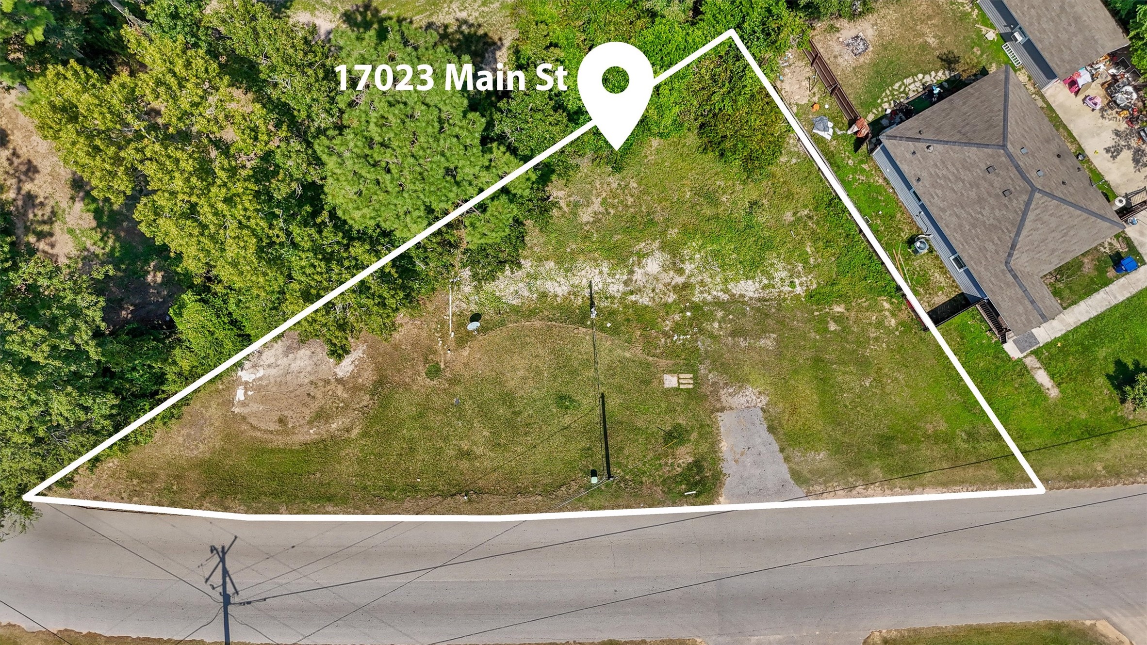 17023 Main Street Splendora, TX 77372 - Photo 2 of 9 a view of swimming pool from a balcony