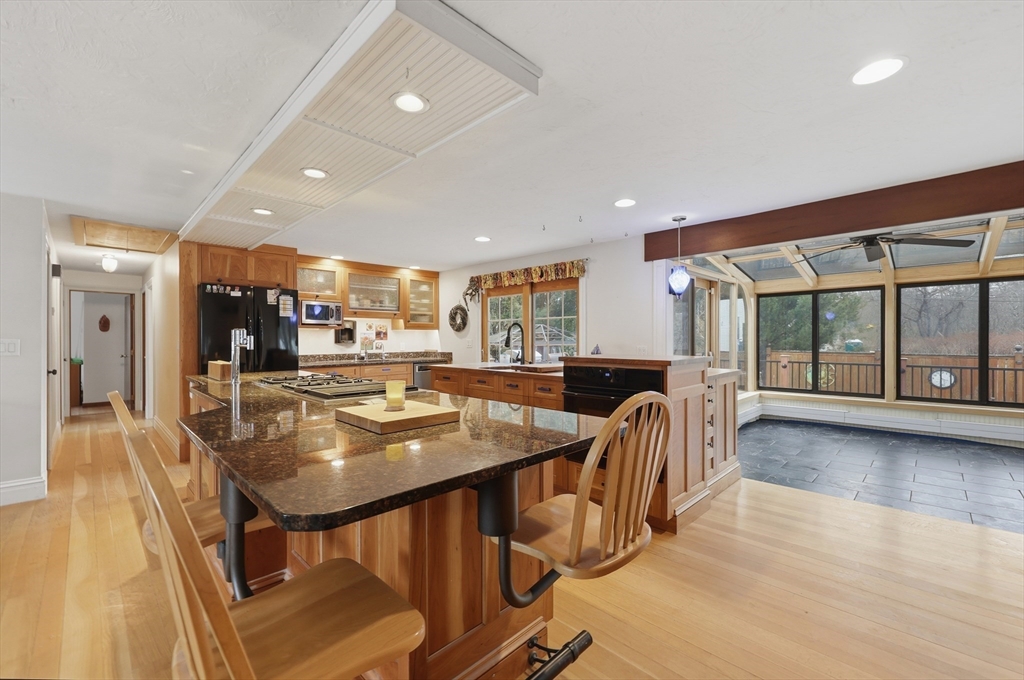 128 Derby Street Worcester, MA 01604 - Photo 2 of 34 a dining room with furniture and a floor to ceiling window