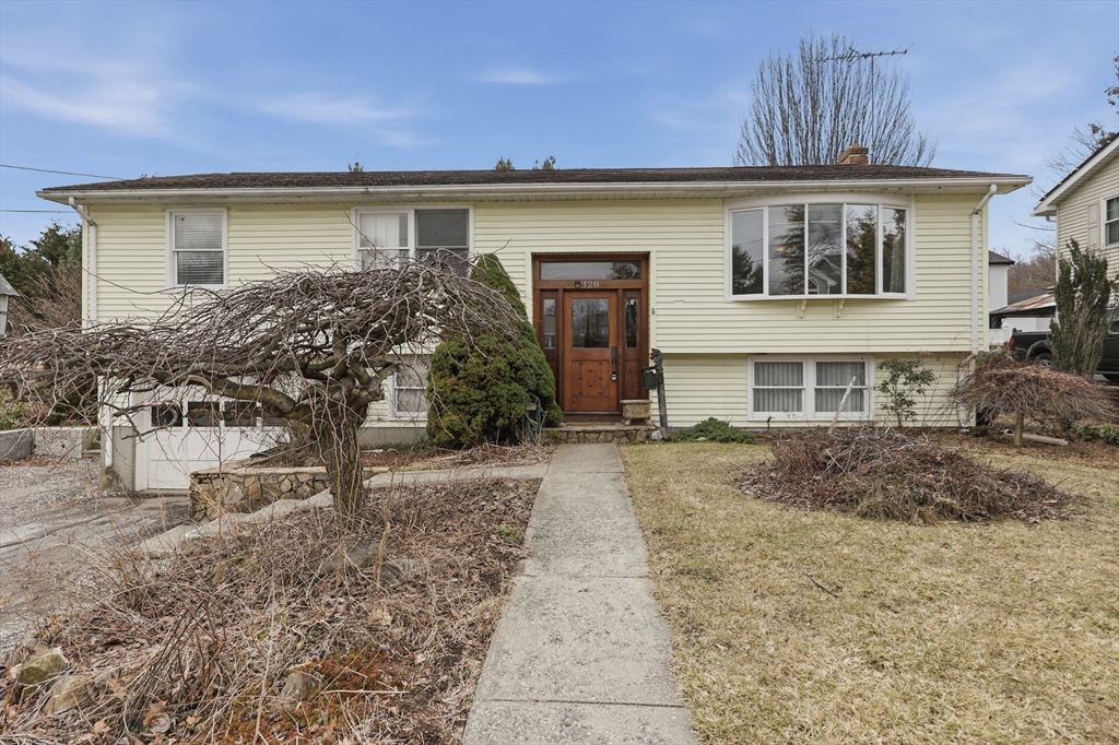 128 Derby Street Worcester, MA 01604 - Photo 31 of 34 a front view of a house with garden