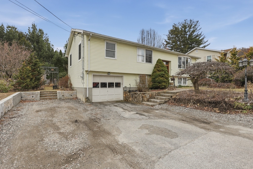 128 Derby Street Worcester, MA 01604 - Photo 32 of 34 a view of a house with a yard