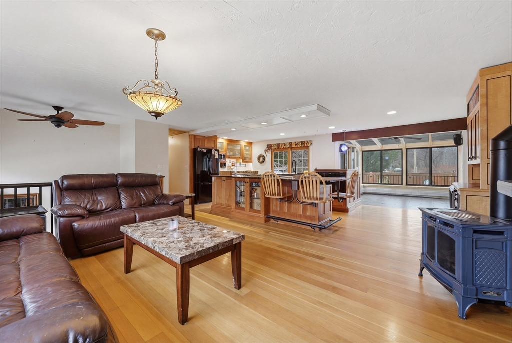 128 Derby Street Worcester, MA 01604 - Photo 4 of 34 a living room with furniture and a wooden floor