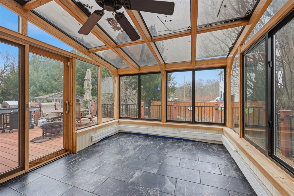 128 Derby Street Worcester, MA 01604 - Photo 6 of 34 a view of empty room with wooden floor and floor to ceiling window