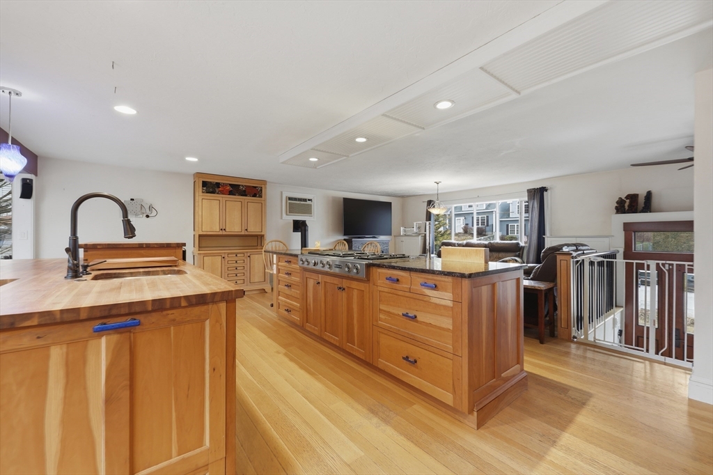 128 Derby Street Worcester, MA 01604 - Photo 9 of 34 a kitchen with lots of counter top space and appliances