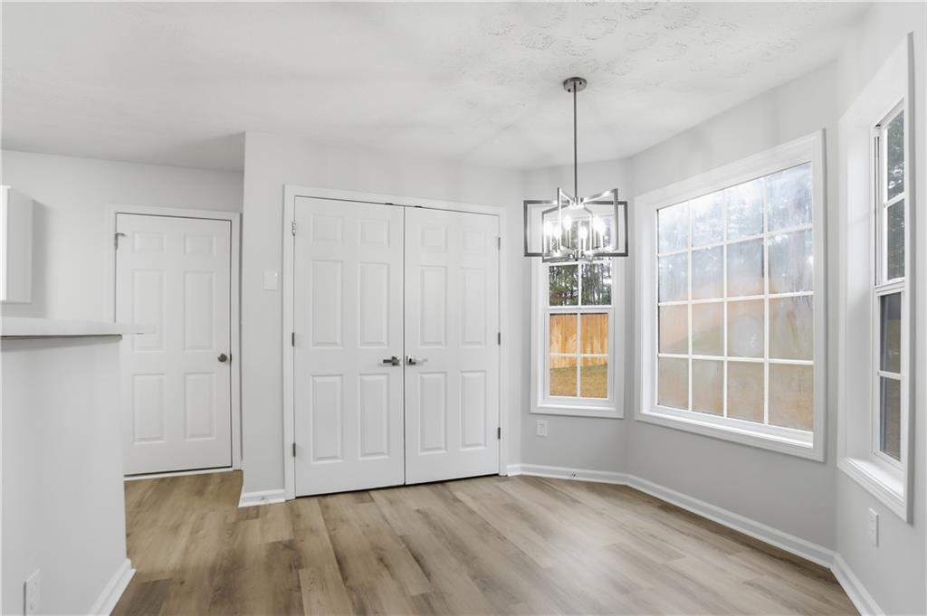 5556 Claridge Circle Stonecrest, GA 30038 - Photo 3 of 25 a view of an empty room with a window