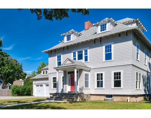 a front view of a house with a porch