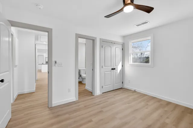 wooden floor & windows in a room