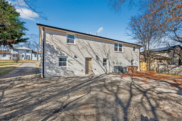a view of a house with a snow in the background