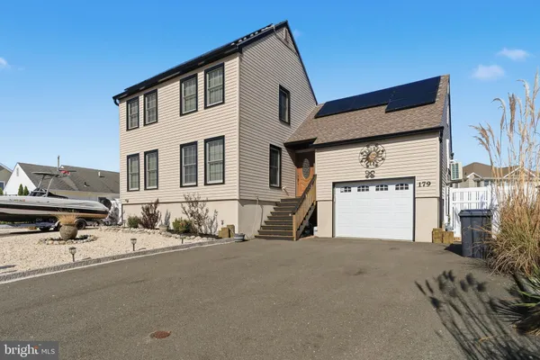 a view of a house with a patio